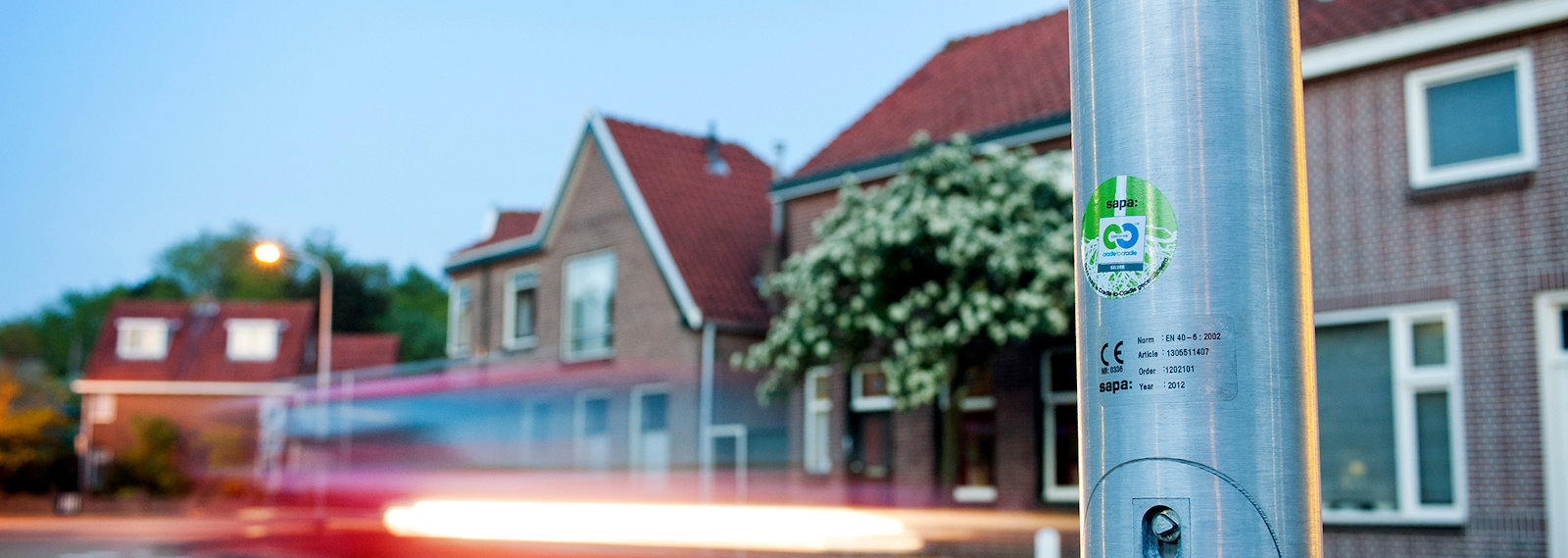 traffic pole, road, residential houses