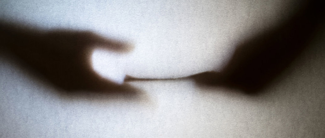 image of two hands exchanging money