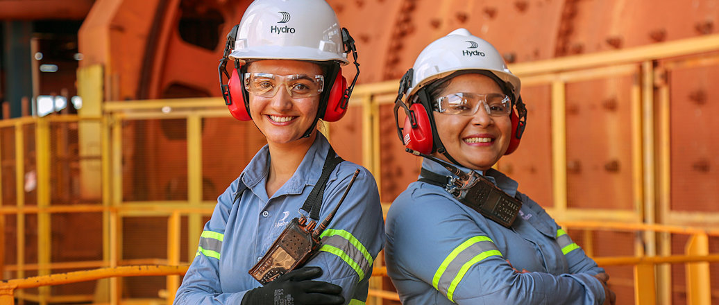 a few firemen wearing helmets
