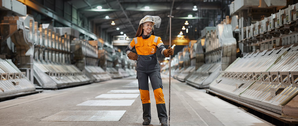 a woman standing in a facility