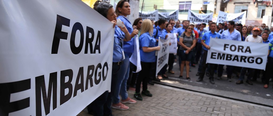 a group of people holding signs