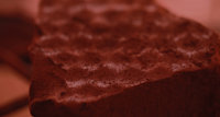 a close up of a chocolate cake