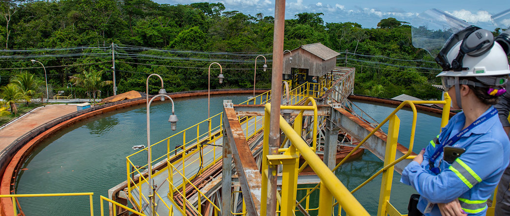 a man standing on a bridge