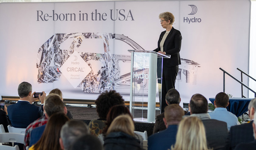 a person standing in front of a crowd of people