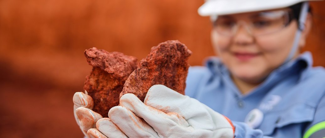 a person holding a teddy bear