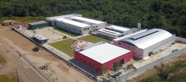 a large building with a parking lot