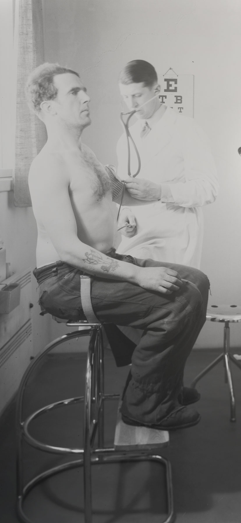 Company physician Eyvind Thiis-Evensen and his patient