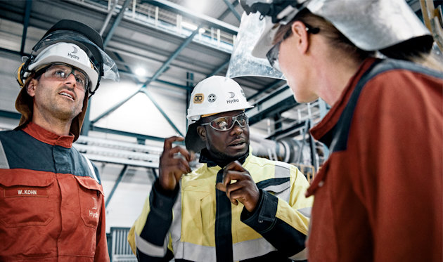 Small group of Hydro employees in protective gear